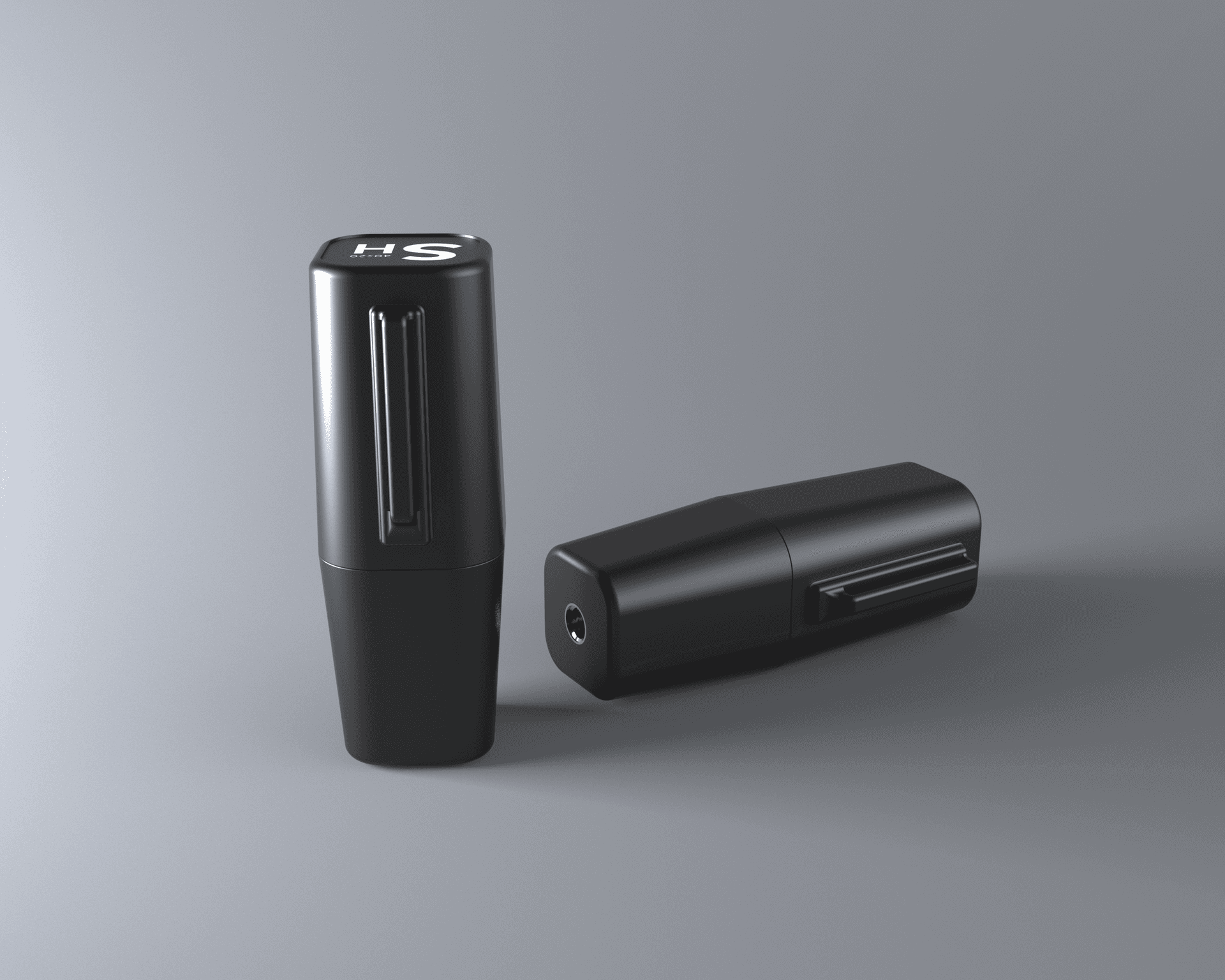 Two Tequitrack beacons, one standing up, one on its side