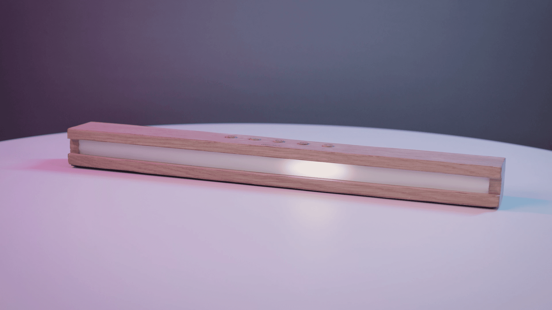 Mentric EMDR light bar sitting on a white table